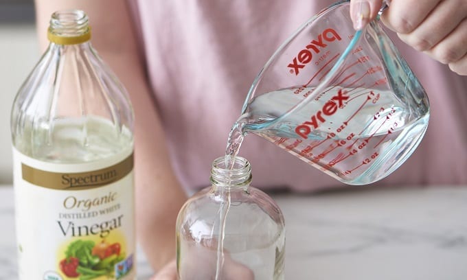 Using Vinegar To Clean Glass Bottle